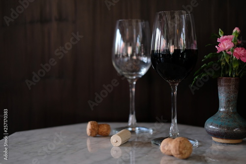 two glasses of white wine on a table