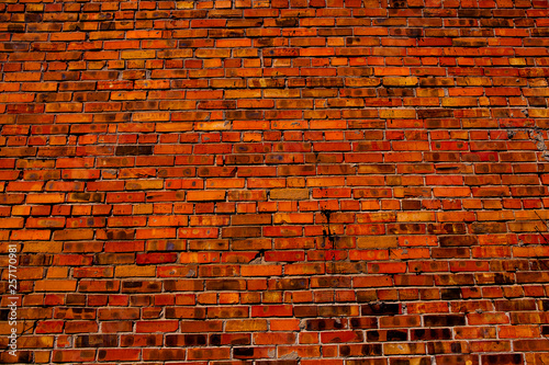 Old red brick wall texture background. Grunge red wall. Grungy Wide Brickwall. Grunge Red Stonewall Background. 