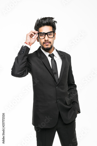 Portrait of handsome young indian businessman isolated on white background. Positive human emotions facial expressions, feelings, attitude perception
