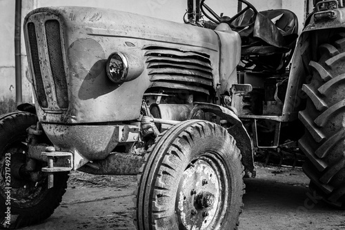 Classic tractor, old rusty tractor, black and white