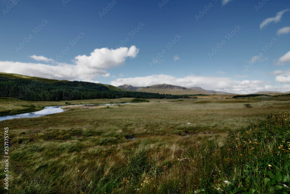 landscape with blue sky and clouds in scotland