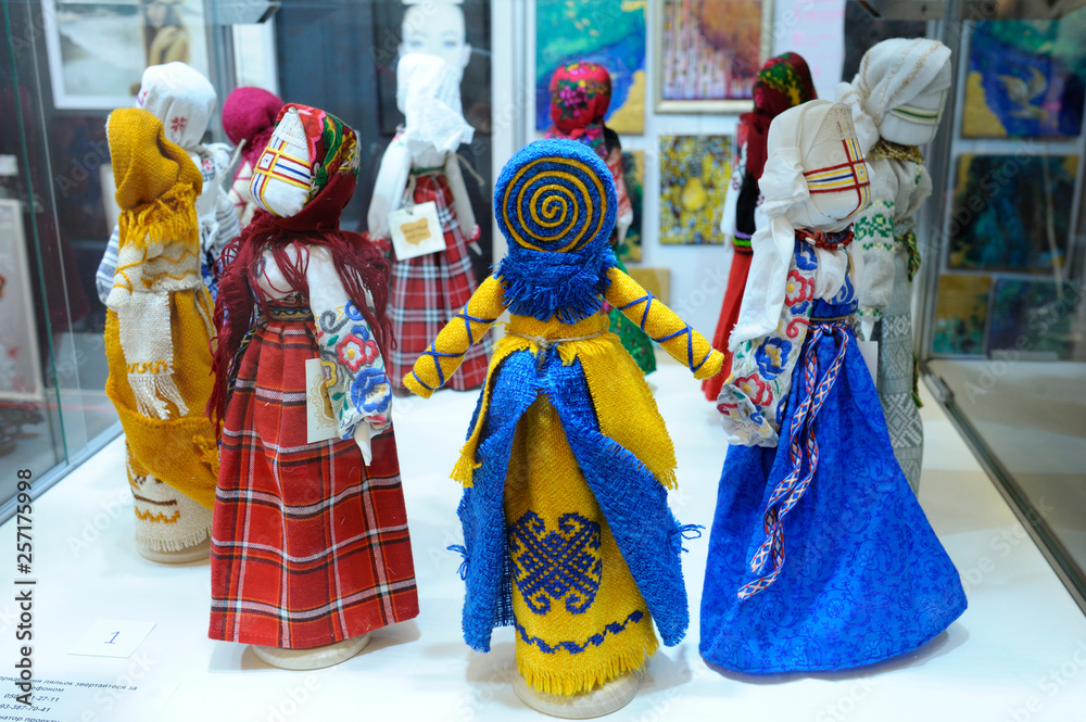 Traditional Ukrainian toys placed on a stand
