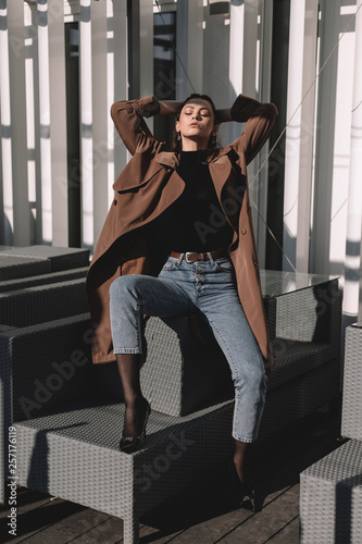 Fashion model, outdoor shooting, beautiful young girl stylishly dressed, sun shade © gomeniuk_alex