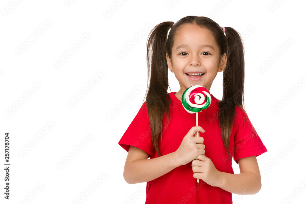 Beautiful cute little child girl with sweet candy lollipop isolated on white background Beautiful cute little child girl with sweet candy lollipop isolated on white background