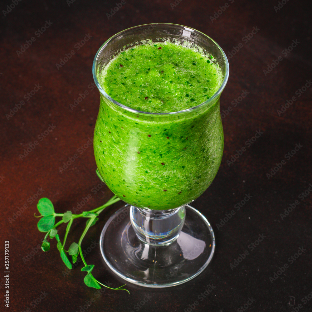 green smoothies (greens, spinach, celery - detox) super food. Food background green smoothies (greens, spinach, celery - detox) super food. Food background