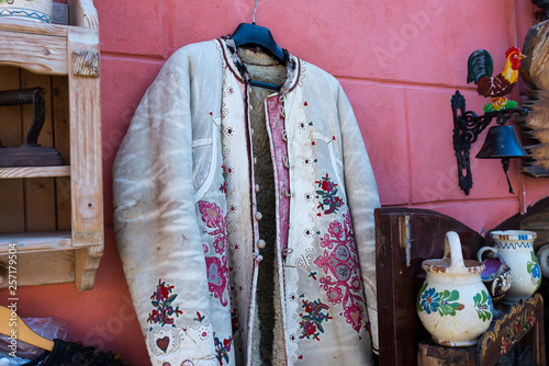 Hand made traditional colorful decorated saxon coat on the gift shop.
