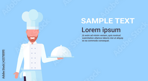 chef cook holding covered platter with dish man in uniform professional occupation food cooking concept male cartoon character portrait blue background horizontal copy space