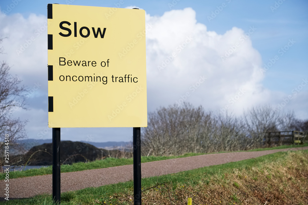 Slow beware of oncoming traffic sign road safety