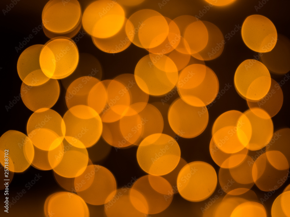 Orange blurred out lights with black background Orange blurred out lights with black background