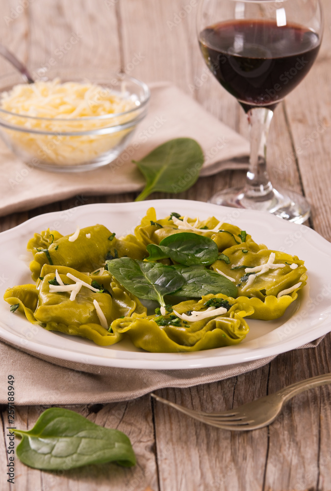 Spinach ravioli with ricotta cheese filling.