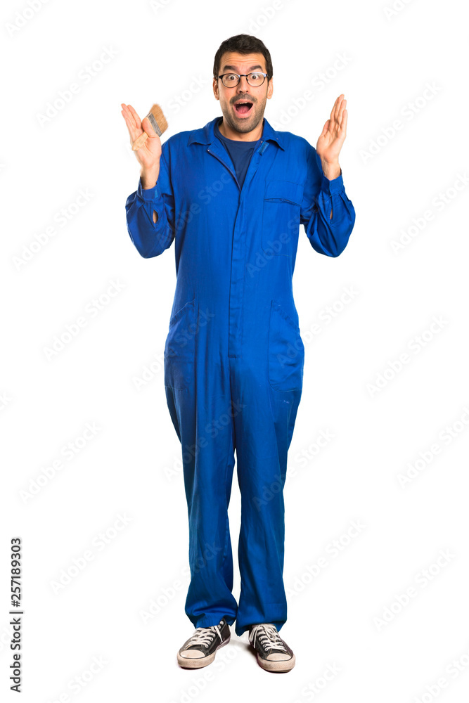 A full-length shot of a Painter man with surprise and shocked facial expression on isolated white background