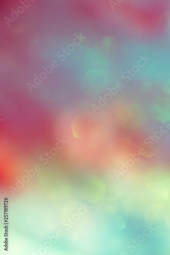 blurred background with colorful green pink yellow colors. blur wallpaper with light dots - Bilder