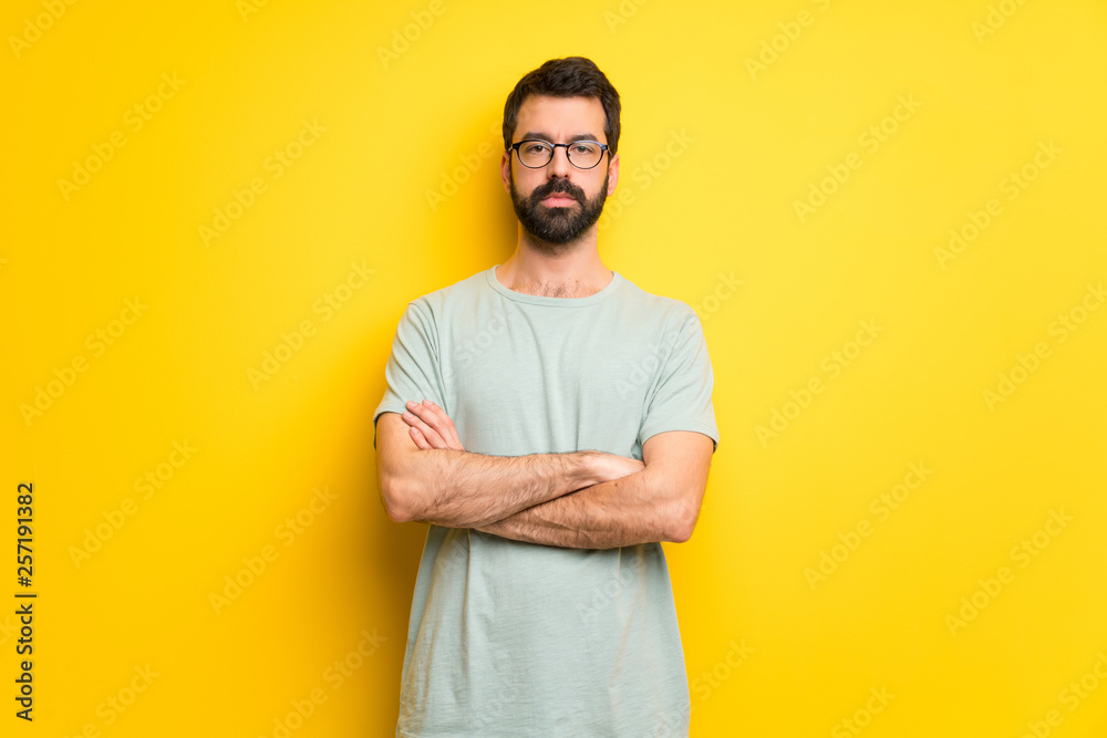Man with beard and green shirt portrait Man with beard and green shirt portrait