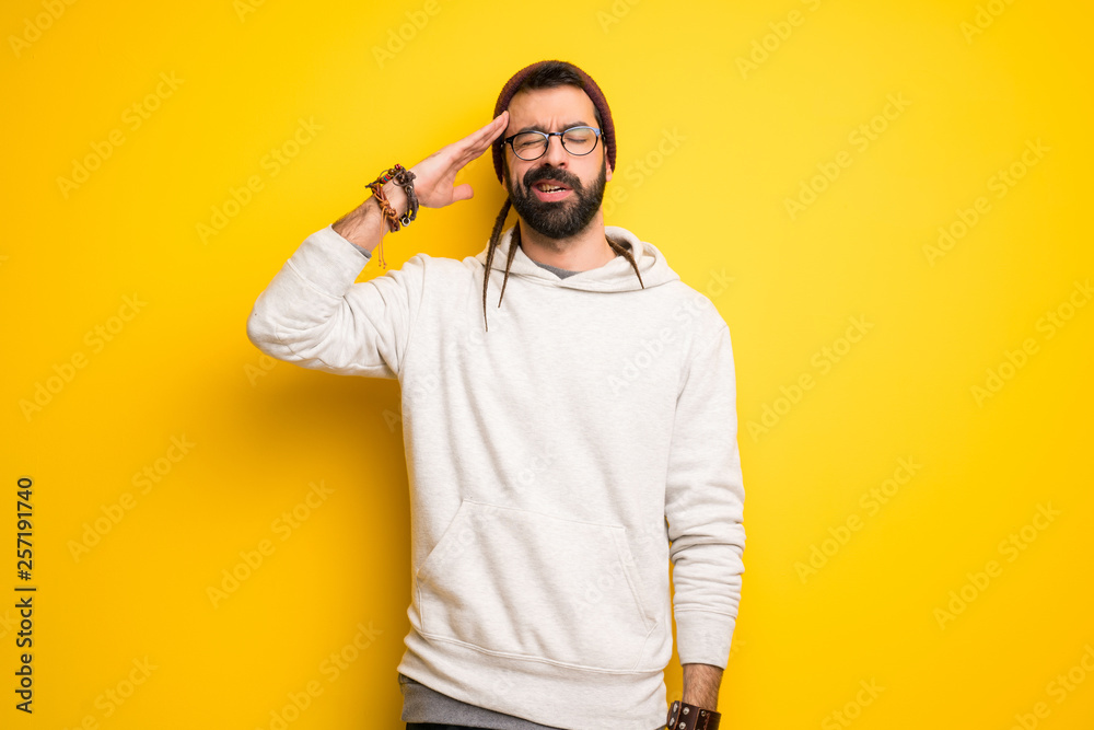 Fototapeta premium Hippie man with dreadlocks unhappy and frustrated with something
