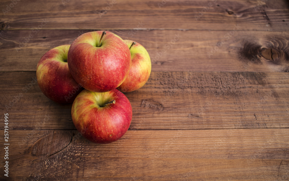 Apples on a wooden background. Proper diet. Healthy diet. Vegetarianism. Proper Breakfast. The right snack. Apples on a wooden background. Proper diet. Healthy diet. Vegetarianism. Proper Breakfast. The right snack.