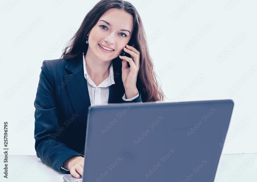 Thoughtful business woman the office, the conversation on the phone, smiling. Thoughtful business woman the office, the conversation on the phone, smiling.