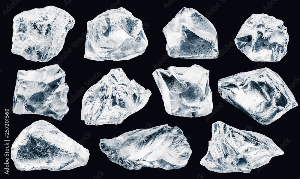 Set of pieces of crushed ice, isolated on black background,  Clipping path for each piece included.