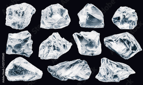 Set of pieces of crushed ice, isolated on black background, Clipping path for each piece included.