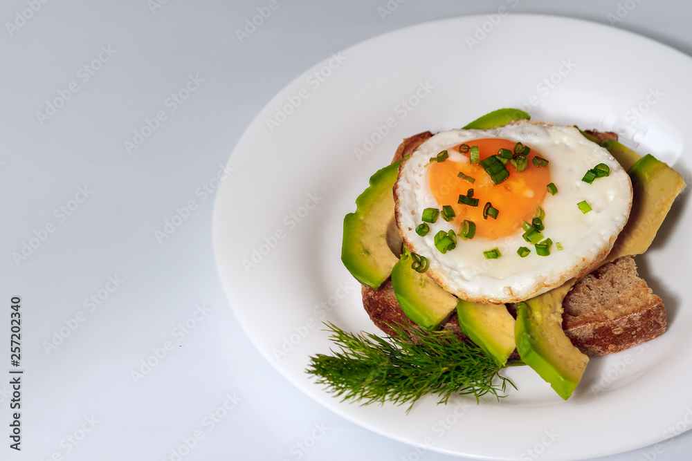 On the plate is a fried egg. Food for all On the plate is a fried egg. Food for all