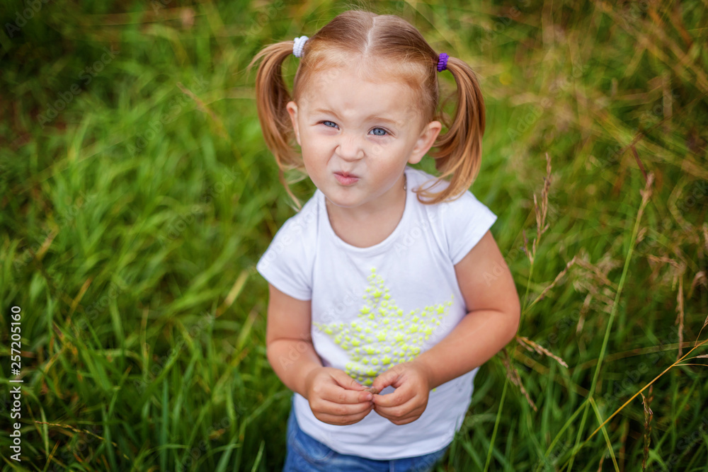 Portrait of happy cute little girl outdoor. Kid palying in park, garden, fairy forest. Happiness. Healthy preschool children summer activity Portrait of happy cute little girl outdoor. Kid palying in park, garden, fairy forest. Happiness. Healthy preschool children summer activity