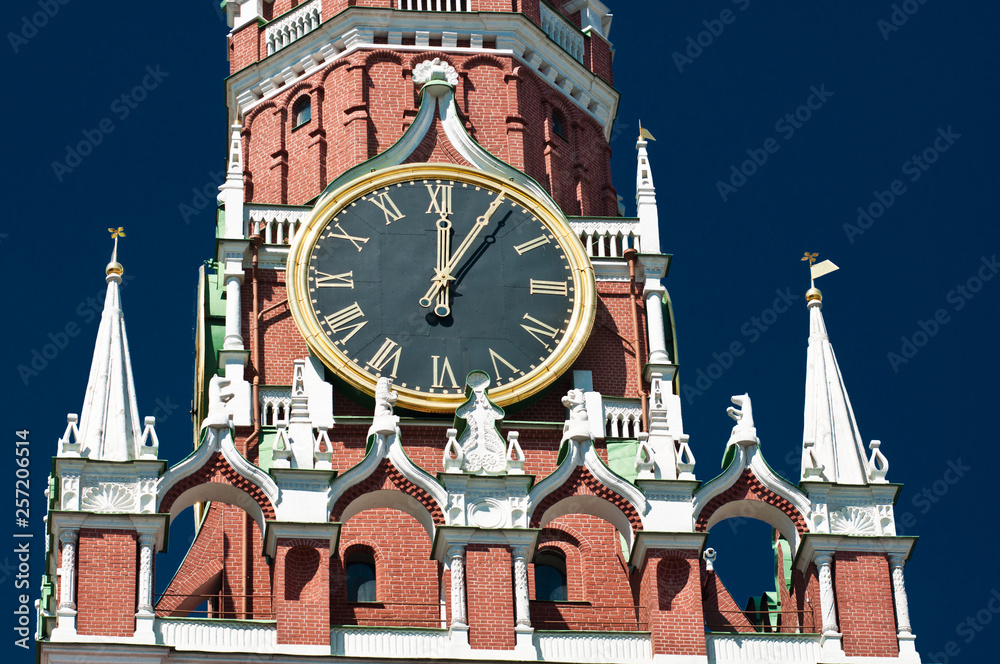 The Kremlin Clock (Kremlin Chimes), close-up. Five minutes past twelve. Spasskaya Tower. Moscow. Russia