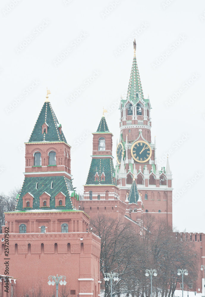 Winter day. Heavy snowfall. Blizzard. Spasskaya Tower of Moscow Kremlin. Red Square. Moscow. Russia