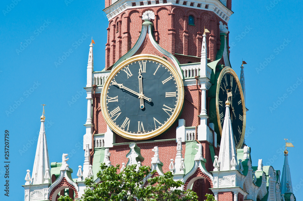 Kremlin chiming clock on the Spasskaya Tower. Close-up. Ten minutes to twelve. Moscow. Russia