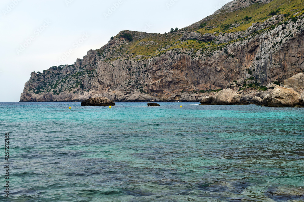 Beautiful sea bay with turquoise water and mountains, Cala Figuera