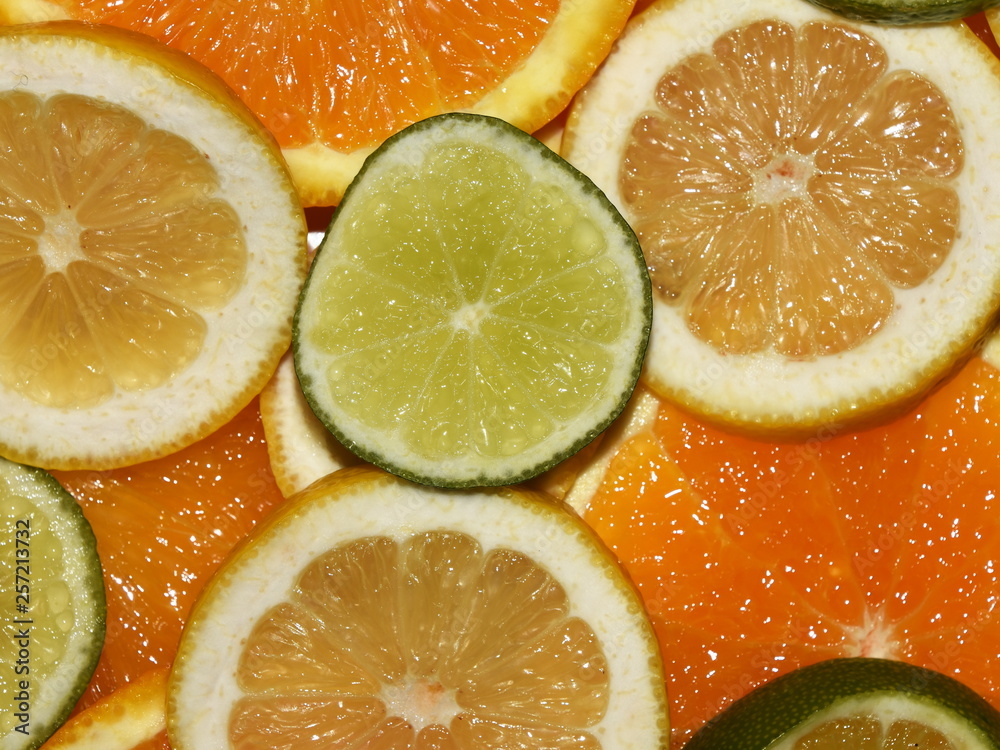 Closeup on slices of different citrus fruits Closeup on slices of different citrus fruits