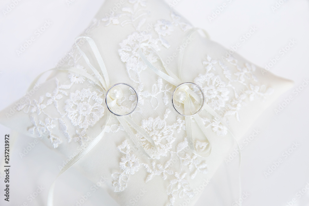 Gold wedding rings on the stand for rings Gold wedding rings on the stand for rings