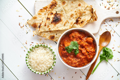 Photos Fresh and tasty Chicken tikka masala served in ceramic bowl