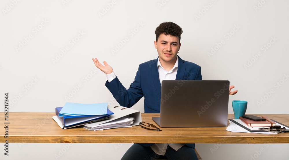 Business man in a office unhappy for not understand something Business man in a office unhappy for not understand something