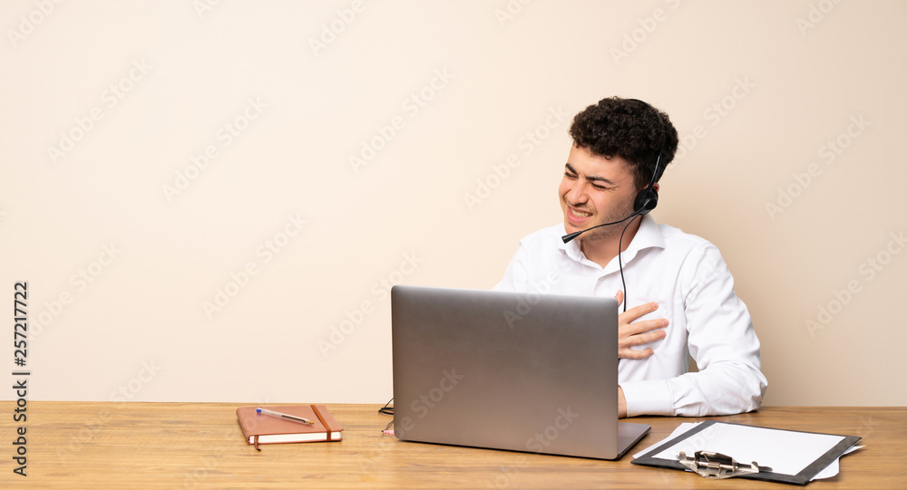 Telemarketer man having a pain in the heart Telemarketer man having a pain in the heart