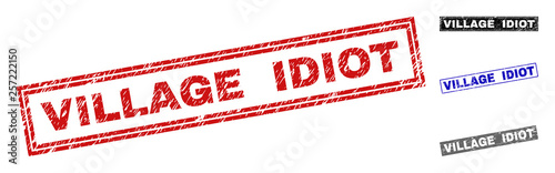 Grunge VILLAGE IDIOT rectangle stamp seals isolated on a white background. Rectangular seals with grunge texture in red, blue, black and grey colors.