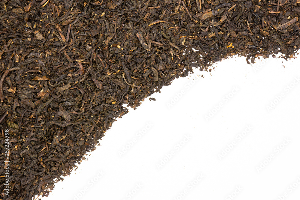 Lot of pieces of dry black tea earl grey flatlay isolated on white background Lot of pieces of dry black tea earl grey flatlay isolated on white background