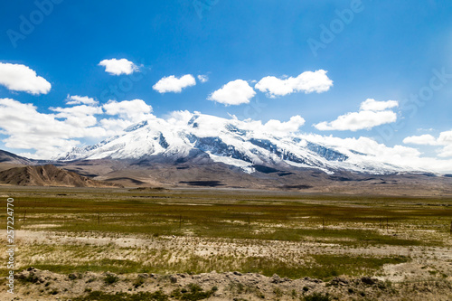 The majestic Muztagh Ata  7546m  as seen from Karakorum Highway  Xinjiang  China. Connecting Kashgar to the Pakistan Border across the Pamir plateau  this road has some of the best views of China