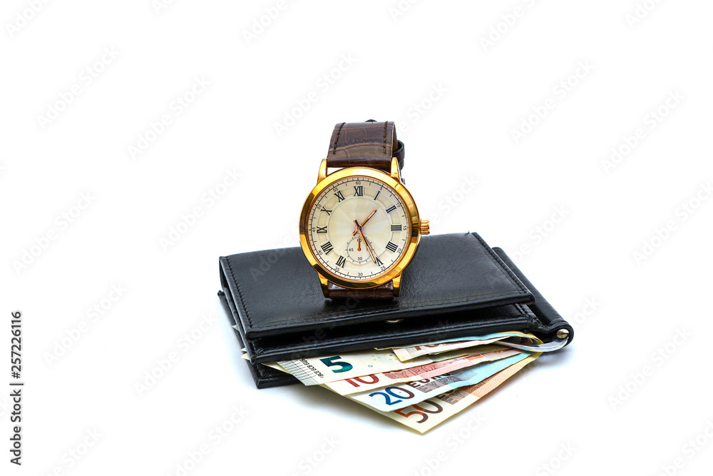 Photograph, isolate on a white background - wallet, banknotes of 50 euros, a wrist men's watch. Photograph, isolate on a white background - wallet, banknotes of 50 euros, a wrist men's watch.