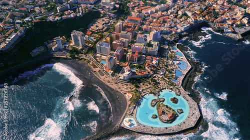 view of puerto de la cruz and the pools of lagos de martianes photo