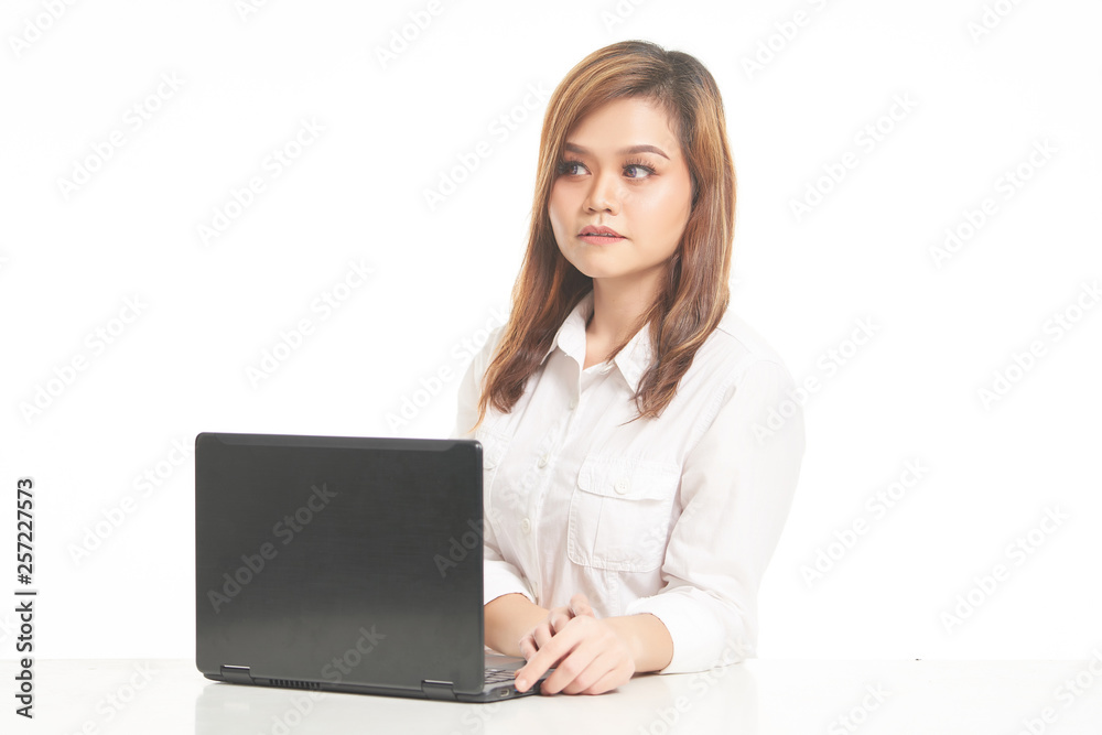 Office Lady In White Shirt using Laptop and File Office Lady In White Shirt using Laptop and File