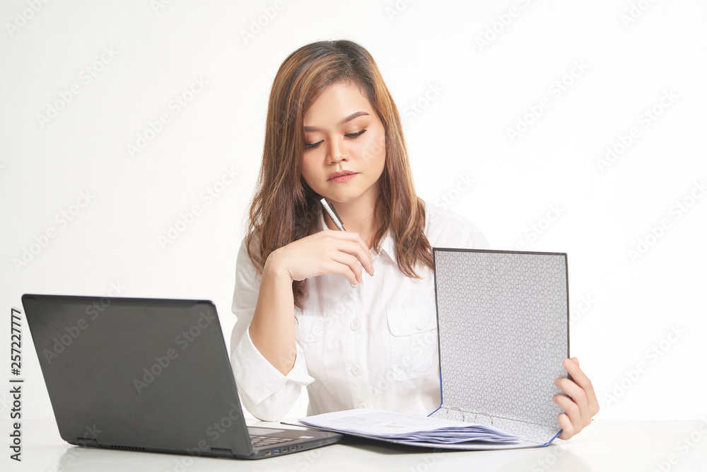 Office Lady In White Shirt using Laptop and File Office Lady In White Shirt using Laptop and File