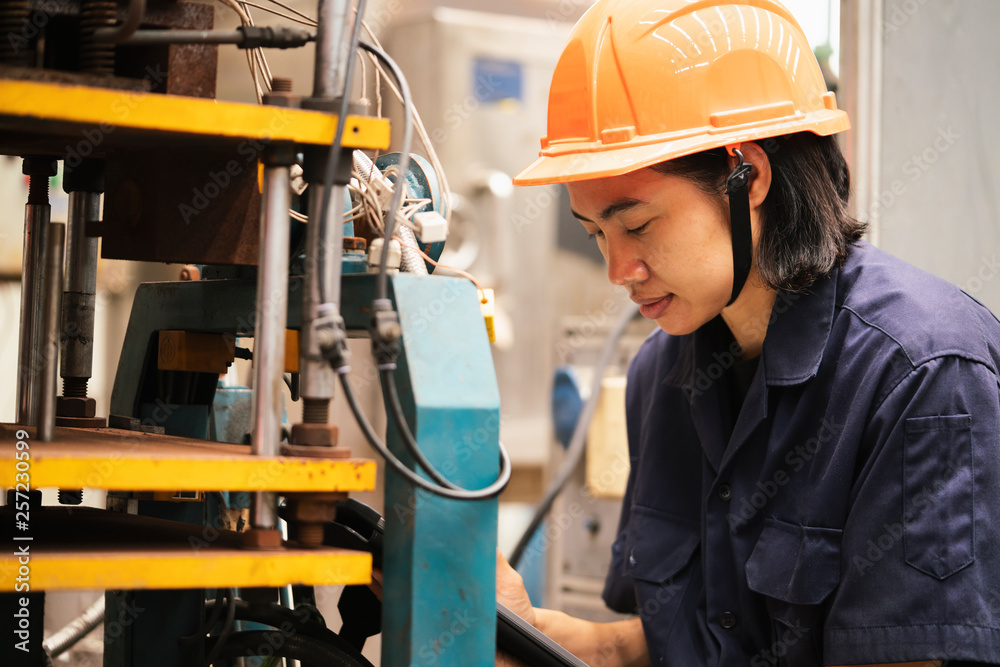 young asian woman engineer set up and testing machine in the laboratory factory, engineering and industrial concept young asian woman engineer set up and testing machine in the laboratory factory, engineering and industrial concept
