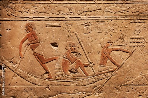 People on riverboat, relief on ancient Tomb of Sakkara, made at 2300 BC in Egypt, saved by Carlsberg Glyptotek photo