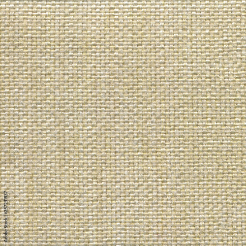 Beige textile textured background. Vintage detailed fashion background for designers and composing collages. Luxury textured genuine fabric of high and natural quality.