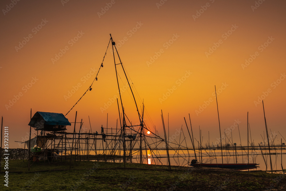 Fishing tools of fisherman in the morning at Huai Luang dam, Udonthani province, Thailand. Fishing tools of fisherman in the morning at Huai Luang dam, Udonthani province, Thailand.