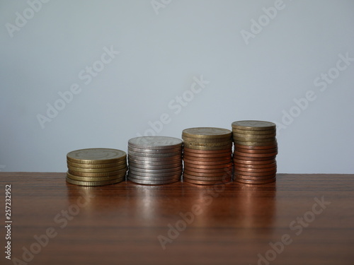 stack of coins on white background