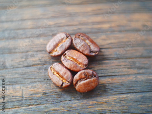 aroma coffee beans on wooden background