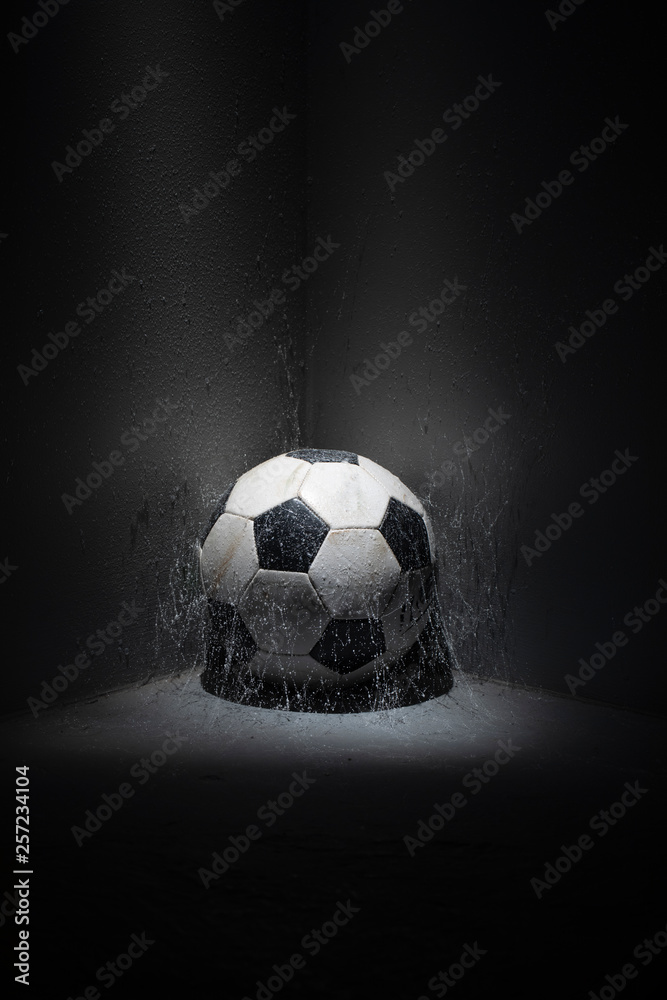 soccer ball in the corner with spider web