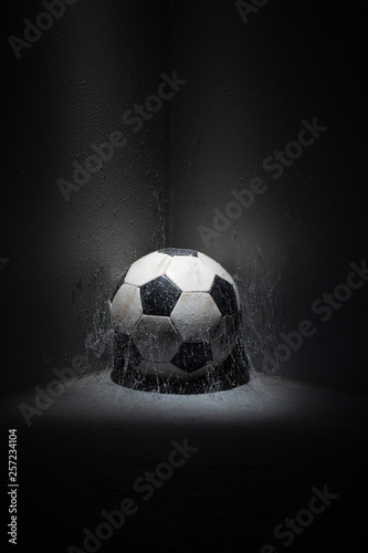 soccer ball in the corner with spider web
