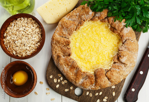 Galetta with oat flakes and cheese photo