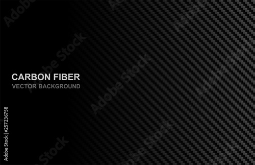 Abstract .Carbon fiber background. black background ,light and shadow. Vector. © lim_pix